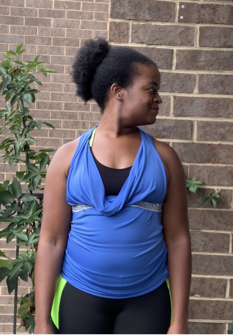 Still image of Michelle Barnes looking over left shoulder