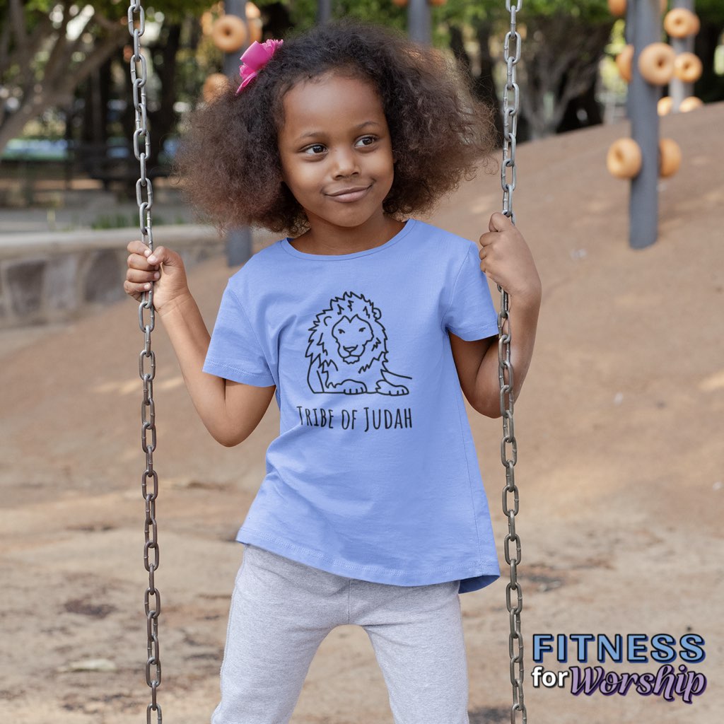 girl on a playground wearing blue Lion Tribe of Judah Short Sleeve T-Shirt for Toddlers by Fitness for Worship