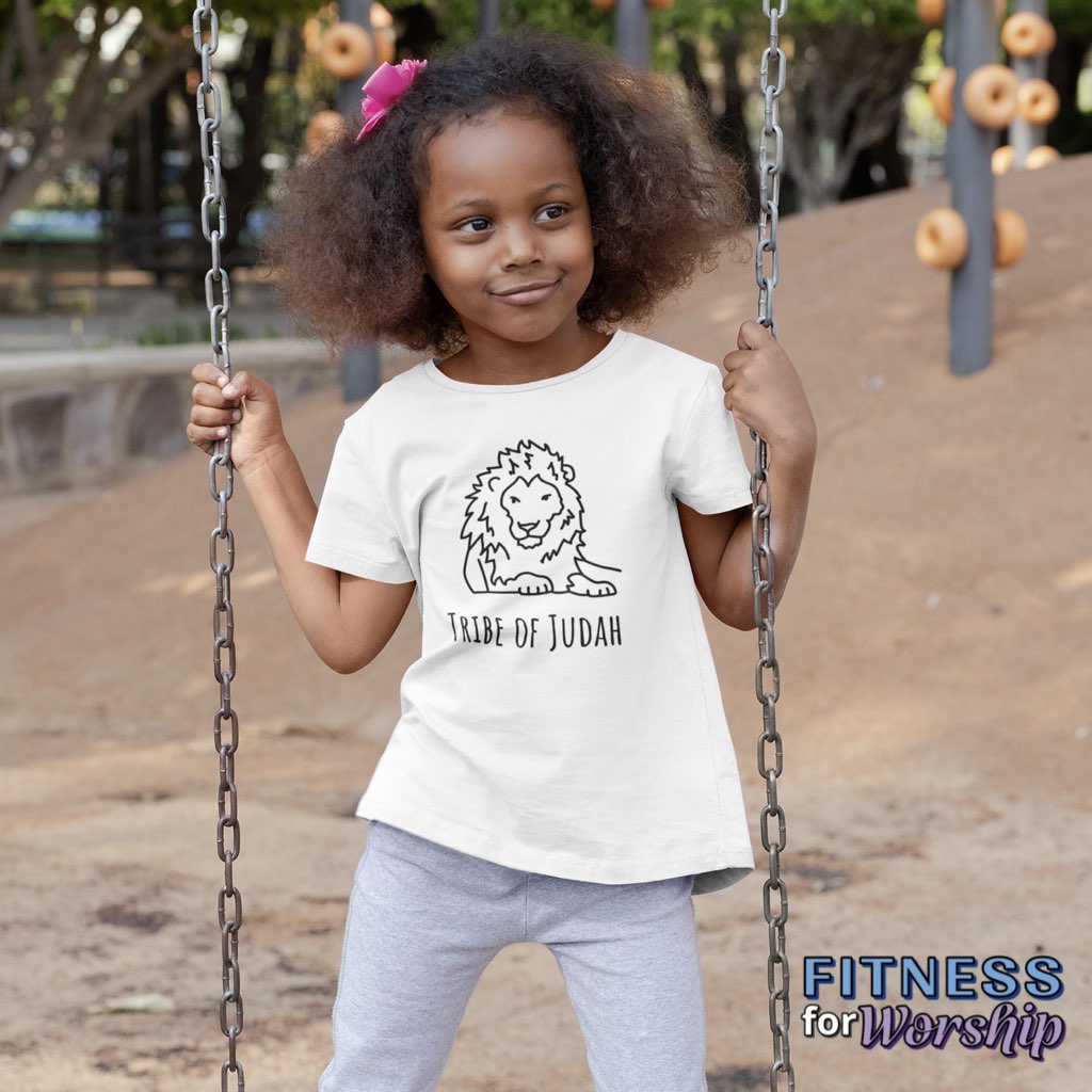 girl on a playground wearing white Lion Tribe of Judah Short Sleeve T-Shirt for Toddlers by Fitness for Worship