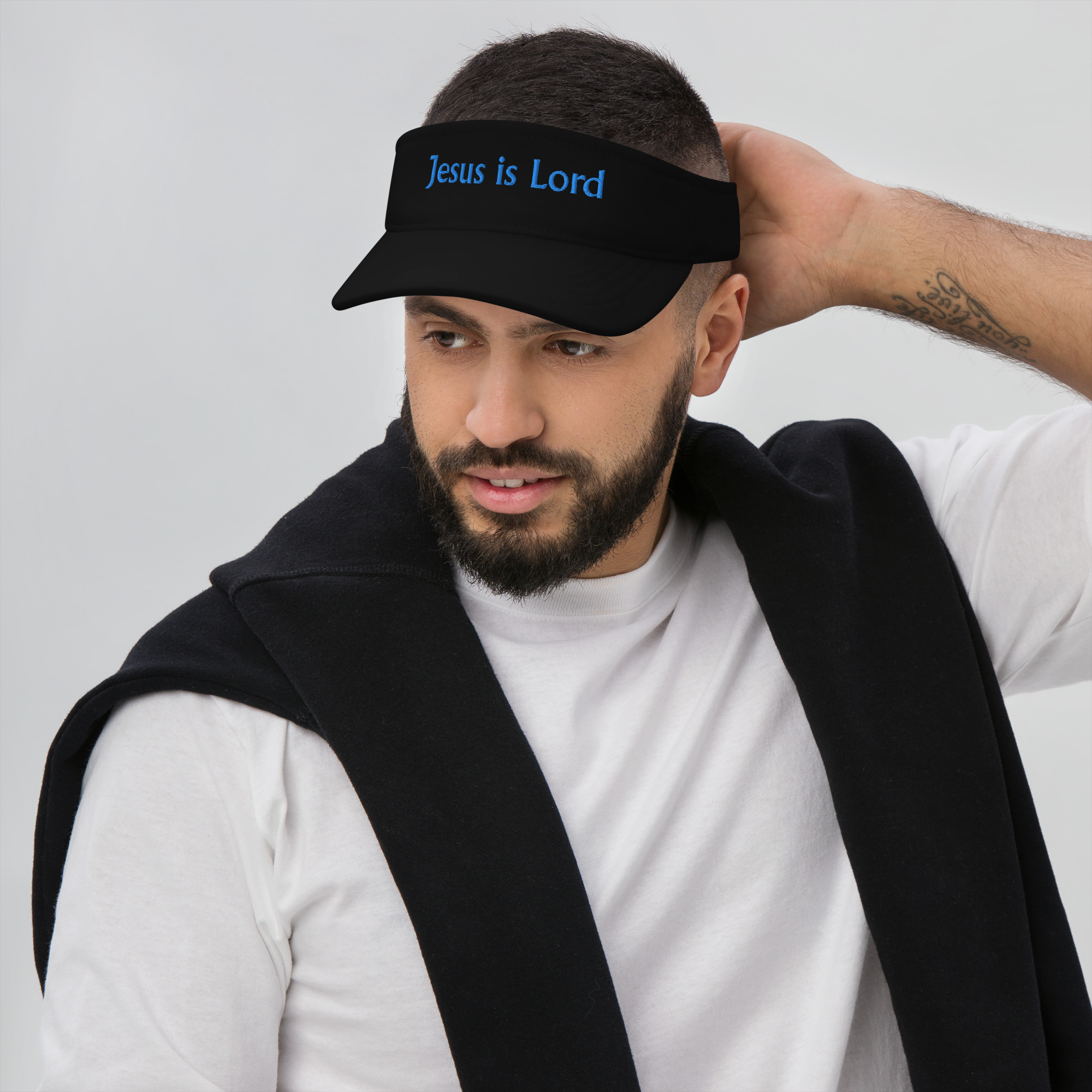 man wearing black Jesus is Lord Visor by Fitness for Worship