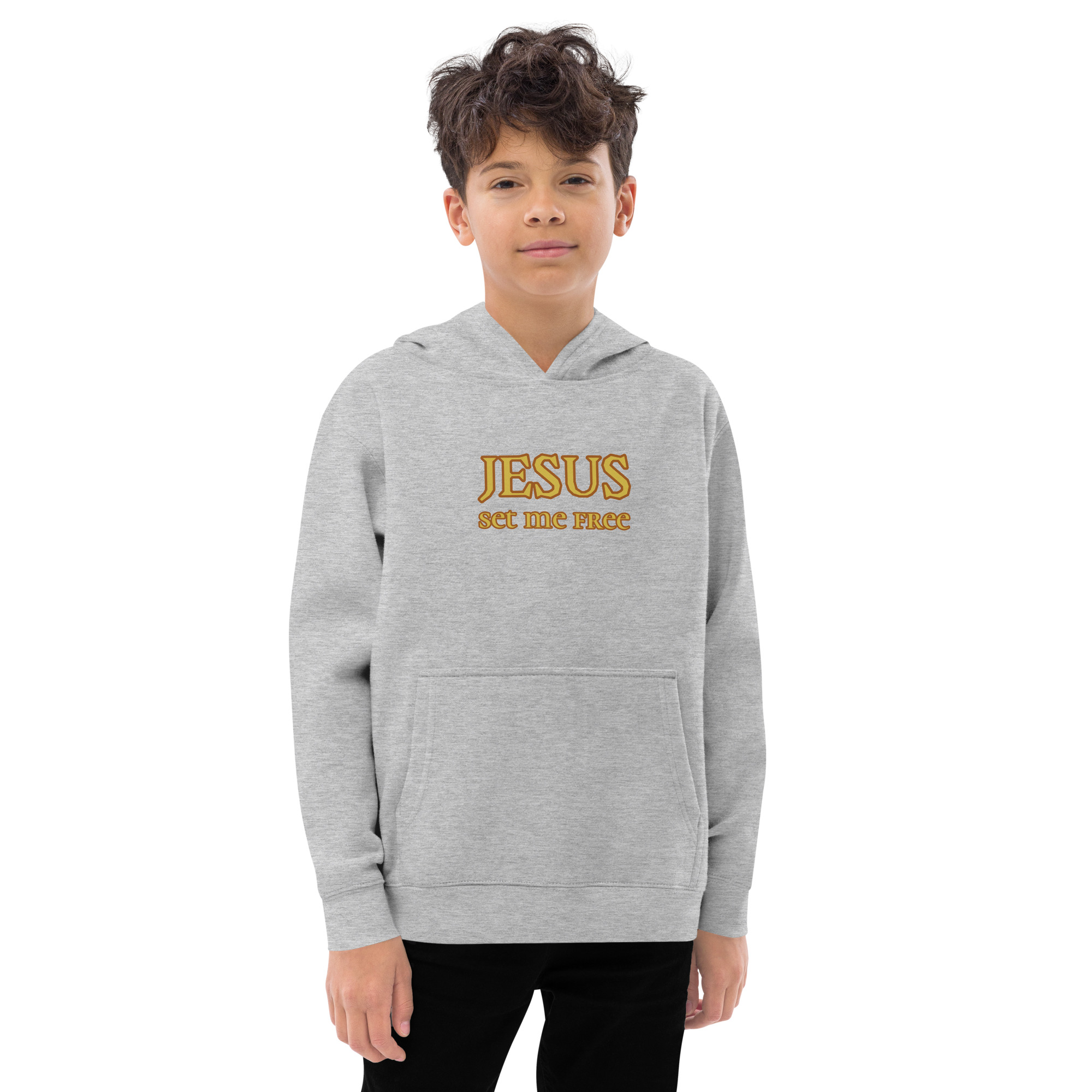 boy wearing athletic heather “Jesus Set Me Free” Fleece Hoodie for Kids by Fitness for Worship
